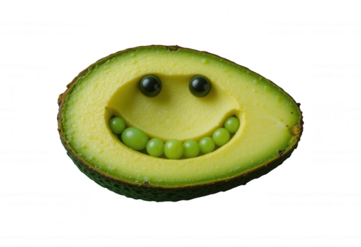Avocado smile: A whimsically crafted avocado half, transformed into a smiling face, with grapes as eyes and teeth, evoking a sense of playful culinary creativity.