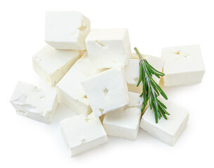 Feta cheese isolated. Greek fitaki cheese pieces on white background. Feta block with rosemary herb Top view.  Package design element.