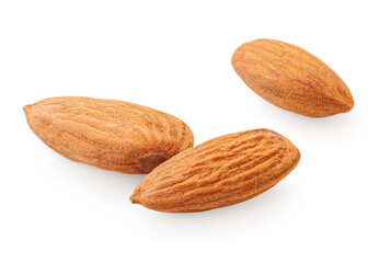 Three Almond nut seeds  isolated on white background. Whole brown peeled almond nuts macro.
