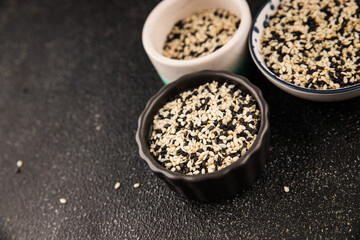 Sesame spice mix white and black tasty fresh gourmet food background on table rustic food top view copy space keto and paleo diet vegetarian and vegan food