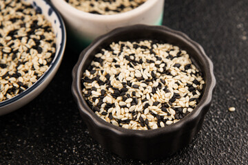 Sesame spice mix white and black tasty fresh gourmet food background on table rustic food top view copy space keto and paleo diet vegetarian and vegan food