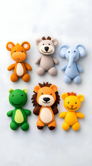 Fototapeta premium Adorable fondant animal figurines; lion, bear, elephant, frog, hippo, deer