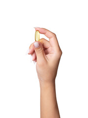 Female hand holding omega 3 capsule isolated on white background close-up. Vitamins and biological...
