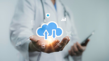 Doctor using cloud technology for secure data upload and download, symbolizing innovation in health information exchange and connectivity