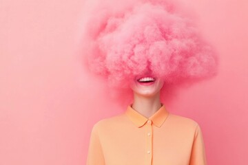 Woman smiling with a pink cloud covering her head against a pastel pink background, conveying joy and creativity in a playful and modern style