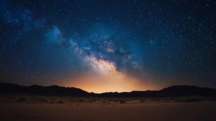 Fototapeta premium Starry Night Sky over Desert Landscape with Milky Way