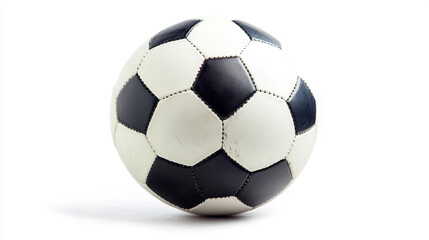 Fototapeta premium Close up of a black and white soccer ball on a white background in a studio setting with shadow