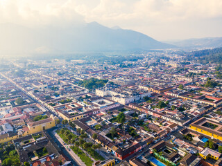 Fototapeta premium Panoramic view of the city of Antigua Guatemala, Guatemala, with mountains in the background.