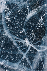 Here we see a very closeup view of a unique piece of ice that is beautifully adorned with a...