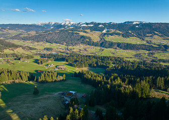 Aerial  landscape photo  in early spring in the Bregenz Forest Mountains near Sulzberg, Vorarlberg,...