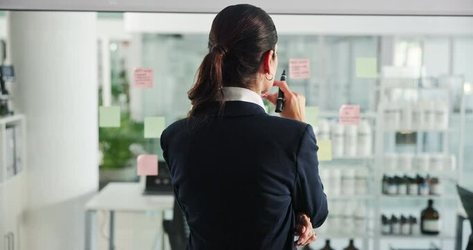 Office, businesswoman and planning with sticky note for writing, brainstorming and project solution. Back, female manager and thinking with mind map for ideas, problem solving and corporate strategy