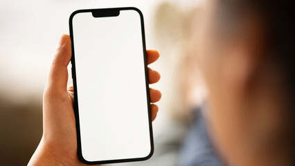 Woman holding a mobile phone