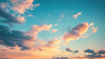 Sky with scattered clouds at dusk with warm colors
