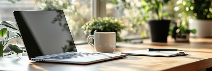 Modern workspace with a sleek laptop, coffee, and a notebook on a wooden desk, contemporary office desk with soft natural lighting from a nearby window, blurred background with indoor plants. 