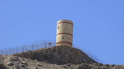 Watchtower and barbed fence on the border with Egypt