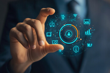 A hand holding a glowing digital interface with various icons in a futuristic business setting