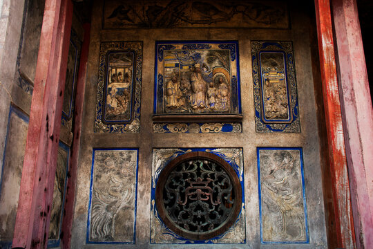 Carving sculpture antique architecture with chinese frescoes mural painting drawing on ancient building Kian Un Keng Shrine for thai people traveler travel visit at Kudi Chin town in Bangkok, Thailand