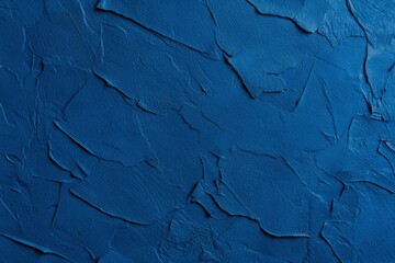 Navy blue textured surface with raised patterns. Elegant, calming, and stylish background