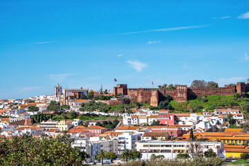 View of Silves town buildings with famous castle and cathedral, Algarve region, Portugal