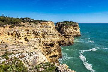 Portuguese coast in Benagil, Algarve, Portugal. Peninsula. Seven Hangging Valleys Trail.