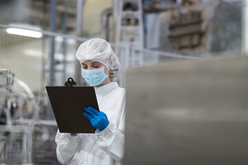 Canned fish factory, seafood manufacturing and processing. Food processing. Conveyor belt and...