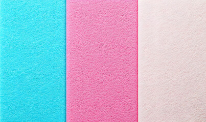 Fototapeta premium Colorful felt sheets in blue, pink, and cream for craft projects