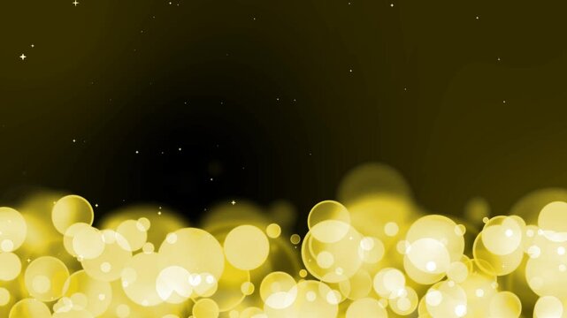 Circle bubles glow yellow slow motion random size with falling white stars on the yellow background