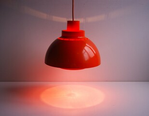 Obraz premium Orange ceiling lamp in plastic. Denmark 1970s.