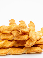 pile of twisted pastry isolated on white background