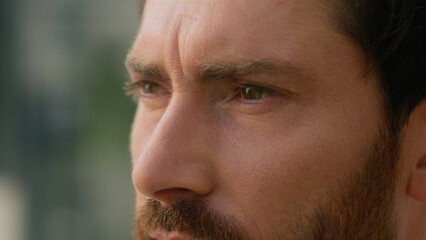 Obraz premium Extreme close up eyes wrinkled skin face of happy smiling pensive Caucasian middle-aged businessman adult business man male guy in city look away looking at camera health vision cataract medicine