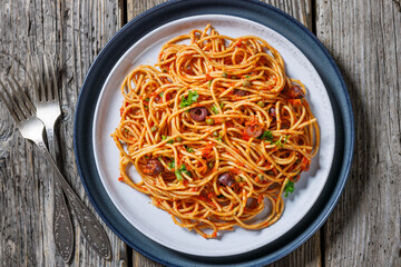 vegan whole grain pasta alla puttanesca on a plate