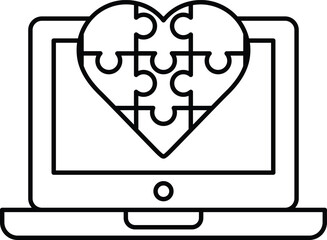 A puzzle piece heart is displayed on a laptop screen