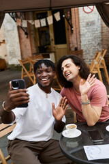 Capturing joy during a romantic cafe date shared by two handsome young men