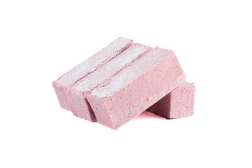 Several cranberry pastila bars on a white background.