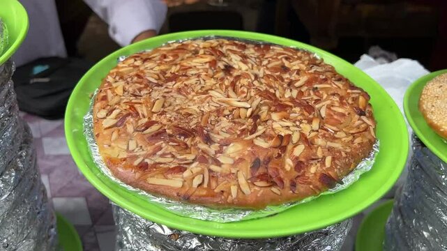 Dry Fruit Sheermal being sold in a road side stall in Zakaria Street, Kolkata