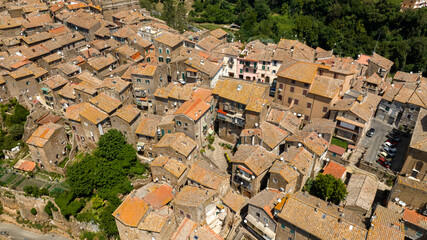 Aerial view of the red roofs of an Italian town. Historic center in Italy.