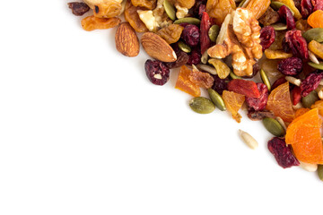 Dried fruit and nuts trail mix on white background