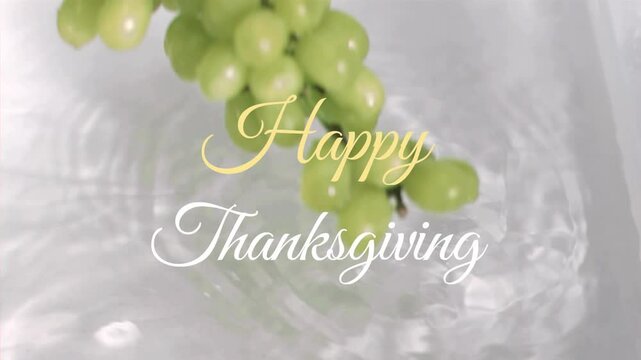 Thanksgiving animation with green grapes submerged in water, festive text overlay