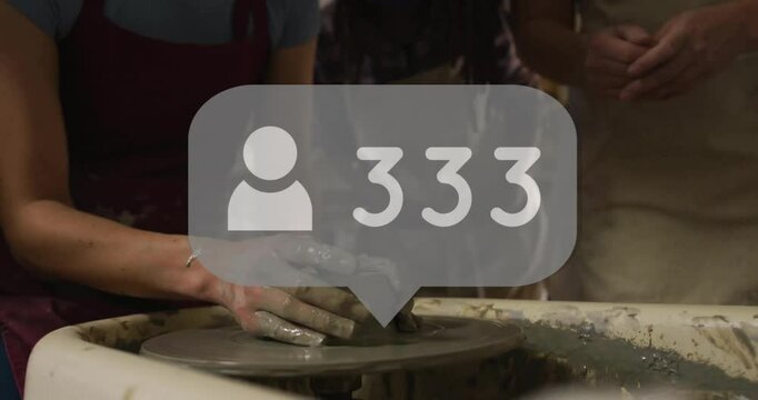 Shaping clay on pottery wheel, artist receiving 500 followers animation notification
