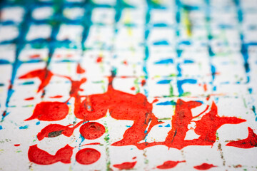 Extreme close up of colorful acrylic paint texture showing brush strokes. Selective focus.