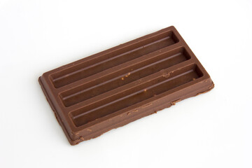 A whole milk chocolate bar isolated on white background.