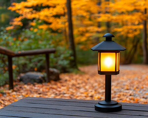 Lantern illuminates an outdoor table, foliage glows in background