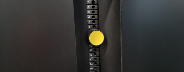 Selected weight machine fitness motivation concept with stack of iron weights for exercise