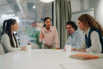 Fototapeta premium Manager leading business meeting with creative team in modern office