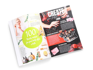 Open magazine isolated on white background, top view