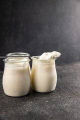 Skyr white yogurt appetizer dish fresh delicious gourmet food background on table rustic food top view copy space keto and paleo diet vegetarian food