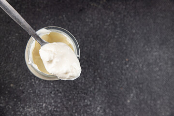 Skyr white yogurt appetizer dish fresh delicious gourmet food background on table rustic food top view copy space keto and paleo diet vegetarian food