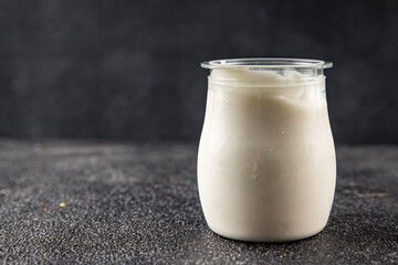 Skyr white yogurt appetizer dish fresh delicious gourmet food background on table rustic food top view copy space keto and paleo diet vegetarian food