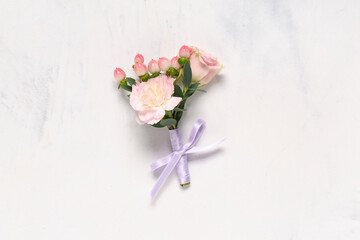 Beautiful boutonniere on light background