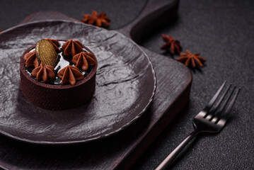 Sweet round tart with chocolate coating and nut filling